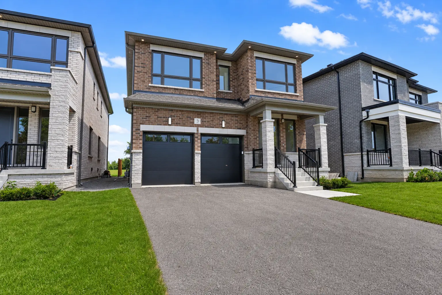 Front exterior in daylight with covered porch and paved driveway
